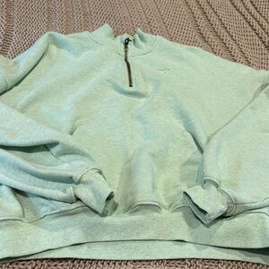 Gymshark Mint Green Quarter-Zip Sweatshirt slightly cropped
